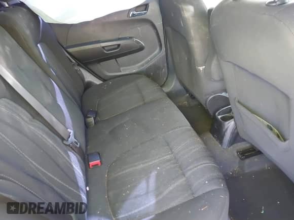 2015 Chevrolet Sonic LT z VIN 1G1JC6SB4F4172040, wystawiony jako IAAI lot #41761563 z przebiegiem 136 867 mil mil oraz . Historia ofert i sprzedaży dostępna na DreamBid. Obrazek 8.