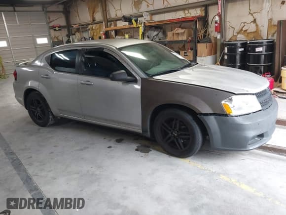✅ 2012 Dodge Avenger SE • VIN: 1C3CDZAB4CN215981 • Lot: 43569656. Listed on IAAI with 134,833 mi. Free auction sales archive from the USA and detailed vehicle history report at DreamBid. Image 1.