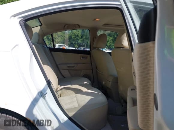 ✅ 2005 Mazda 3 i • VIN: JM1BK12F551281126 • Lot: 43010180. Listed on IAAI with 194,642 mi. Free auction sales archive from the USA and detailed vehicle history report at DreamBid. Image 8.