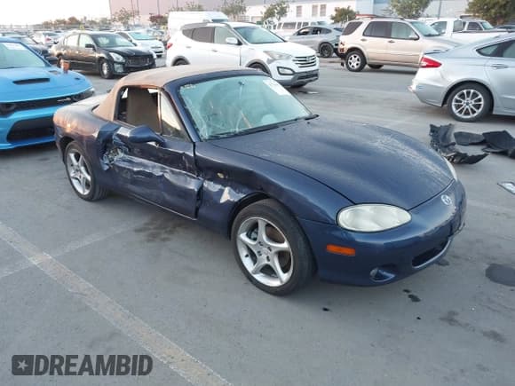 ✅ 2001 Mazda MX-5 Miata • VIN: JM1NB353610206770 • Lot: 43764003. Listed on IAAI with 84,041 mi. Free auction sales archive from the USA and detailed vehicle history report at DreamBid. Image 1.