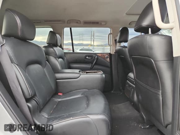 ✅ 2015 Infiniti QX80 • VIN: JN8AZ2NE8F9083017 • Лот: 90280075. Опубликован ранее на Copart с пробегом 139 285 миль. Бесплатный доступ к архиву аукционных продаж из США и подробный отчёт об истории автомобиля на DreamBid. Изображение 11.