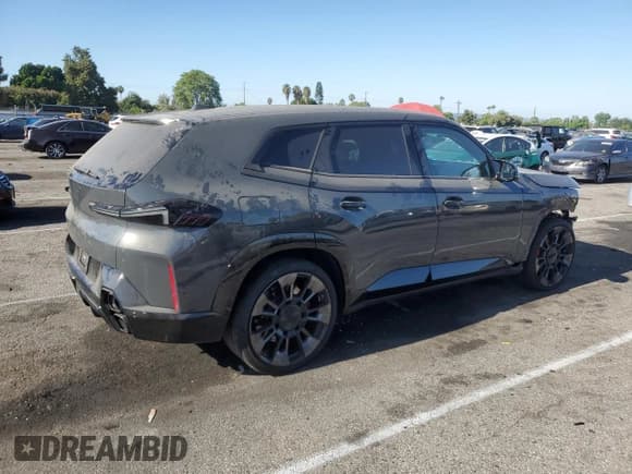 ✅ 2023 BMW XM • VIN: 5YM23CS04P9S41474 • Лот: 64112444. Опубликован ранее на Copart с пробегом 13 109 миль. Бесплатный доступ к архиву аукционных продаж из США и подробный отчёт об истории автомобиля на DreamBid. Изображение 3.