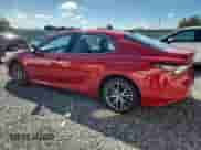 2023 Toyota Camry Hybrid XLE with VIN 4T1F31AK2PU059301, listed as a Copart auction lot 84210305 with 17,836 mi miles and Salvage title. Bid and sale history available at DreamBid. Image 2.