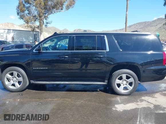 ✅ 2017 Chevrolet Suburban LS • VIN: 1GNSCGKC1HR338621 • Lot: 41696381. Listed on IAAI with 194,687 mi. Free auction sales archive from the USA and detailed vehicle history report at DreamBid. Image 15.