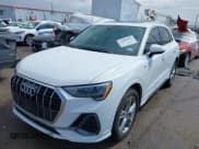 ✅ 2020 Audi Q3 S line Premium • VIN: WA1DECF3XL1088814 • Lot: 43384944. Wystawiony na IAAI z przebiegiem 85 429 mil. Bezpłatny archiwum sprzedaży aukcyjnych z USA i szczegółowy raport historii pojazdu na DreamBid. Zdjęcie 17.
