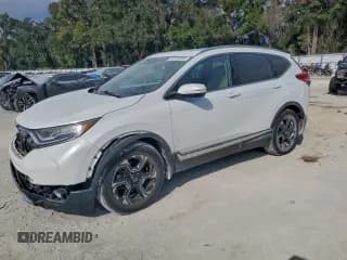 ✅ 2019 Honda CR-V Touring • VIN: 7FARW1H93KE008617 • Лот: 94163095. Опубликован ранее на Copart с пробегом 12 267 миль. Бесплатный доступ к архиву аукционных продаж из США и подробный отчёт об истории автомобиля на DreamBid. Изображение 1.