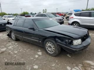 ✅ 1999 Cadillac DeVille • VIN: 1G6KF5498XU710945 • Lot: 61501014. Listed on Copart with 139,930 mi. Free auction sales archive from the USA and detailed vehicle history report at DreamBid. Image 4.
