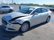 ✅ 2013 Ford Fusion SE Hybrid • VIN: 3FA6P0LU8DR262977 • Lot: 43729571. Listed on IAAI with 115,875 mi. Free auction sales archive from the USA and detailed vehicle history report at DreamBid. Image 2.