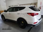 ✅ 2018 Hyundai Santa Fe 2.4L • VIN: 5NMZT3LB2JH088838 • Lot: 57902485. Listed on Copart with 118,294 mi. Free auction sales archive from the USA and detailed vehicle history report at DreamBid. Image 2.
