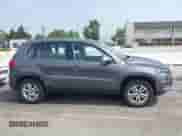 2013 Volkswagen Tiguan SE z VIN WVGAV7AX3DW020767, wystawiony jako IAAI lot #42433752 z przebiegiem 107 913 mil mil oraz . Historia ofert i sprzedaży dostępna na DreamBid. Obrazek 13.