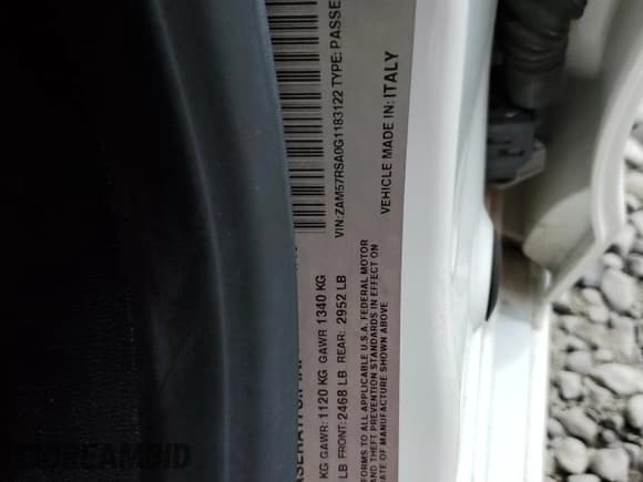 ✅ 2016 Maserati Ghibli S • VIN: ZAM57RSA0G1183122 • Lot: 71105145. Wystawiony na Copart z przebiegiem 78 097 mil. Bezpłatny archiwum sprzedaży aukcyjnych z USA i szczegółowy raport historii pojazdu na DreamBid. Zdjęcie 12.