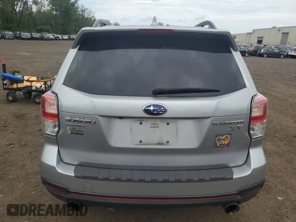 2017 Subaru Forester Premium with VIN JF2SJGECXHH537197, listed as a Copart auction lot 70521415 with 105,322 mi miles and Salvage title. Bid and sale history available at DreamBid. Image 6.