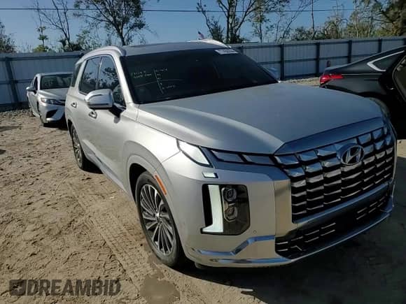 2023 Hyundai Palisade Calligraphy с VIN KM8R74GE4PU597177, выставлен на аукционе Copart как лот 77450264 с пробегом 21 616 миль миль и Списание • Salvage title. История ставок и продаж доступна на DreamBid. Изображение 15.