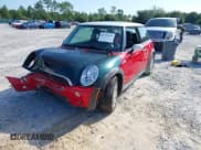 ✅ 2006 MINI Hardtop S • VIN: WMWRE33586TN27239 • Lot: 42775957. Listed on IAAI with 165,133 mi. Free auction sales archive from the USA and detailed vehicle history report at DreamBid. Image 2.