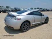 ✅ 2008 Mitsubishi Eclipse GS • VIN: 4A3AK64F68E019647 • Lot: 57472325. Listed on Copart with 219,959 mi. Free auction sales archive from the USA and detailed vehicle history report at DreamBid. Image 3.