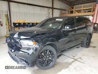 2017 Dodge Durango R/T with VIN 1C4SDHCTXHC869880, listed as a Copart auction lot 61198785 with 132,717 mi miles and Salvage title. Bid and sale history available at DreamBid. Image 1.
