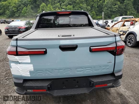 2022 Hyundai Santa Cruz SEL с VIN 5NTJCDAEXNH025366, выставлен на аукционе Copart как лот 64445254 с пробегом 38 771 миль миль и На запчасти • Non repairable. История ставок и продаж доступна на DreamBid. Изображение 6.