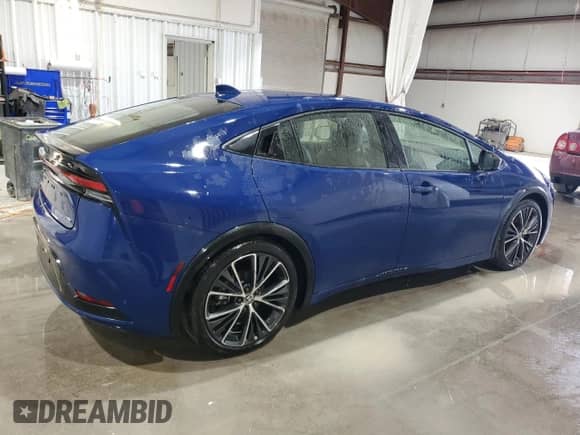 2024 Toyota Prius Limited with VIN JTDADABU3R3023573, listed as a Copart auction lot 80960385 with 5,801 mi miles and Salvage title. Bid and sale history available at DreamBid. Image 3.