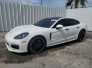 ✅ 2023 Porsche Panamera GTS • VIN: WP0AG2A79PL135140 • Лот: 60926514. Опубликован ранее на Copart с пробегом 12 043 миль. Бесплатный доступ к архиву аукционных продаж из США и подробный отчёт об истории автомобиля на DreamBid. Изображение 1.