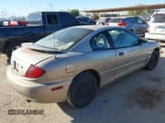 ✅ 2003 Pontiac Sunfire • VIN: 1G2JB12F637113764 • Lot: 43636057. Listed on IAAI with Not provided. Free auction sales archive from the USA and detailed vehicle history report at DreamBid. Image 4.