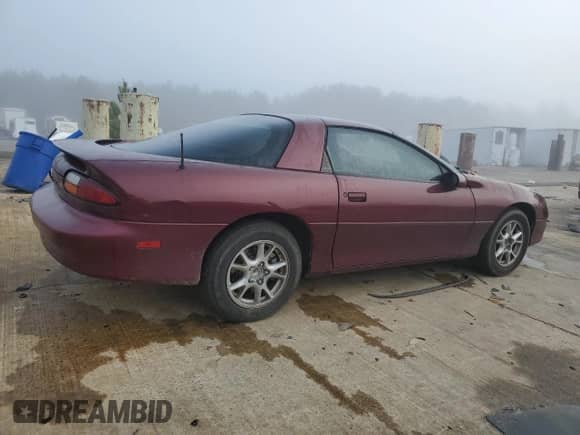 2002 Chevrolet Camaro z VIN 2G1FP22K622114465, wystawiony jako Copart lot #43578235 z przebiegiem 138 920 mil mil oraz Czysty tytuł • Clean title. Historia ofert i sprzedaży dostępna na DreamBid. Obrazek 3.