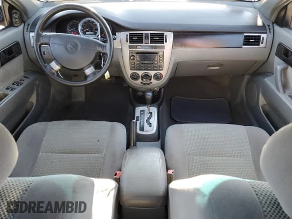 ✅ 2006 Suzuki Forenza • VIN: KL5JD56ZX6K278029 • Lot: 82026904. Wystawiony na Copart z przebiegiem 117 700 mil. Bezpłatny archiwum sprzedaży aukcyjnych z USA i szczegółowy raport historii pojazdu na DreamBid. Zdjęcie 8.