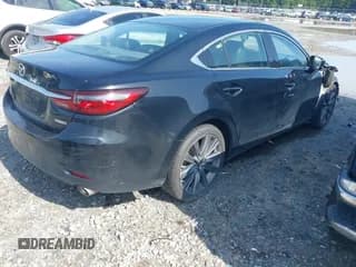 ✅ 2020 Mazda 6 Touring • VIN: JM1GL1VM7L1514644 • Лот: 42702419. Опубликован ранее на IAAI с пробегом 128 895 миль. Бесплатный доступ к архиву аукционных продаж из США и подробный отчёт об истории автомобиля на DreamBid. Изображение 4.