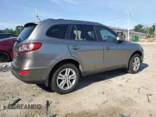 2012 Hyundai Santa Fe SE with VIN 5XYZHDAG0CG167699, listed as a Copart auction lot 63489204 with 87,528 mi miles and Salvage title. Bid and sale history available at DreamBid. Image 3.