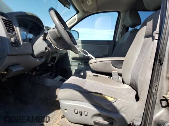 2007 Dodge Dakota SLT с VIN 1D7HW48K97S129387, выставлен на аукционе Copart как лот 74878664 с пробегом 137 525 миль миль и Списание • Salvage title. История ставок и продаж доступна на DreamBid. Изображение 7.