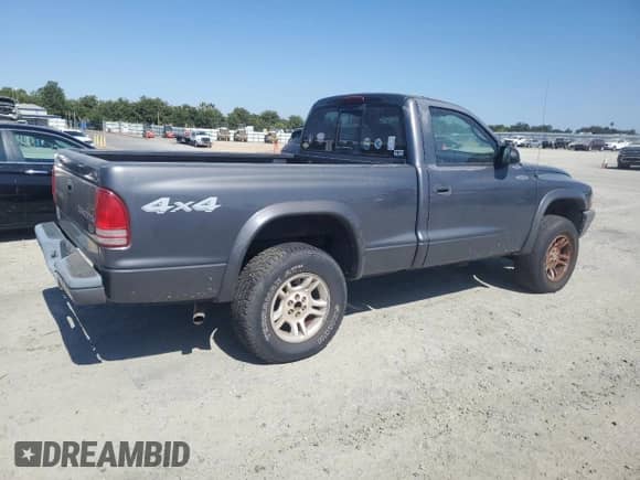 2003 Dodge Dakota with VIN 1D7GG16X13S111000, listed as a Copart auction lot 63535575 with 114,919 mi miles and Clean title. Bid and sale history available at DreamBid. Image 3.