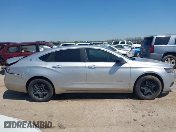 ✅ 2014 Chevrolet Impala LS • VIN: 1G11X5SL7EU108273 • Лот: 41991944. Опубликован ранее на IAAI с пробегом 142 229 миль. Бесплатный доступ к архиву аукционных продаж из США и подробный отчёт об истории автомобиля на DreamBid. Изображение 13.