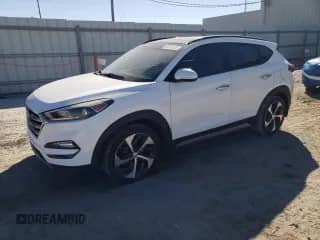 2018 Hyundai Tucson Value z VIN KM8J33A22JU645218, wystawiony jako Copart lot #90871735 z przebiegiem 137 400 mil mil oraz Czysty tytuł • Clean title. Historia ofert i sprzedaży dostępna na DreamBid. Obrazek 1.