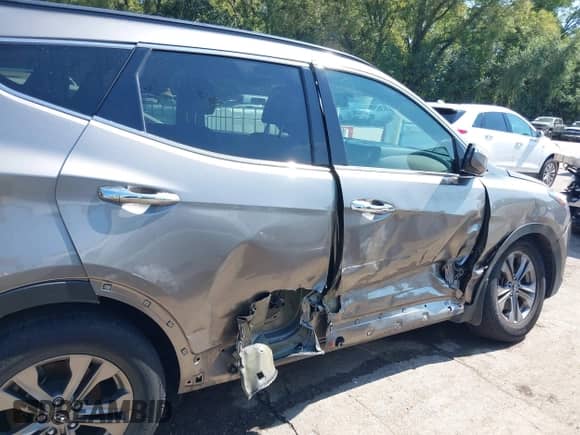 2014 Hyundai Santa Fe with VIN 5XYZU3LB8EG193235, listed as a IAAI auction lot 43285823 with 84,842 mi miles and . Bid and sale history available at DreamBid. Image 6.