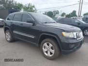 ✅ 2013 Jeep Grand Cherokee Laredo • VIN: 1C4RJFAG7DC502043 • Lot: 42667945. Listed on IAAI with 149,543 mi. Free auction sales archive from the USA and detailed vehicle history report at DreamBid. Image 1.