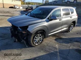 ✅ 2019 Hyundai Santa Fe SE • VIN: 5NMS2CAD2KH081012 • Лот: 86518965. Опубликован ранее на Copart с пробегом 100 041 миль. Бесплатный доступ к архиву аукционных продаж из США и подробный отчёт об истории автомобиля на DreamBid. Изображение 1.