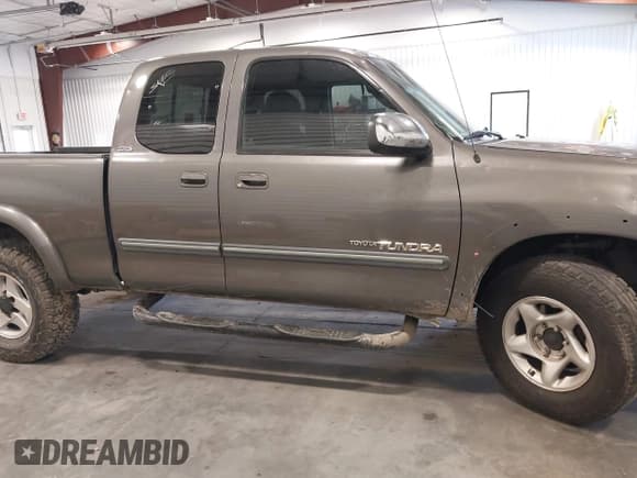 ✅ 2003 Toyota Tundra SR5 • VIN: 5TBBT44103S427800 • Lot: 42988179. Wystawiony na IAAI z przebiegiem 397 558 mil. Bezpłatny archiwum sprzedaży aukcyjnych z USA i szczegółowy raport historii pojazdu na DreamBid. Zdjęcie 13.