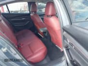 ✅ 2024 Mazda 3 S Carbon Edition • VIN: 3MZBPBCM9RM421270 • Lot: 43604481. Listed on IAAI with 23,354 mi. Free auction sales archive from the USA and detailed vehicle history report at DreamBid. Image 8.