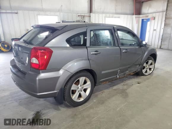 2011 Dodge Caliber Mainstreet с VIN 1B3CB3HAXBD254978, выставлен на аукционе Copart как лот 79866894 с пробегом 170 611 миль миль и На запчасти • Non repairable. История ставок и продаж доступна на DreamBid. Изображение 3.
