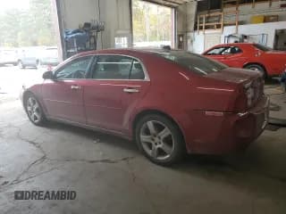 ✅ 2012 Chevrolet Malibu 1LT • VIN: 1G1ZC5E01CF261636 • Lot: 77384084. Listed on Copart with 163,853 mi. Free auction sales archive from the USA and detailed vehicle history report at DreamBid. Image 2.