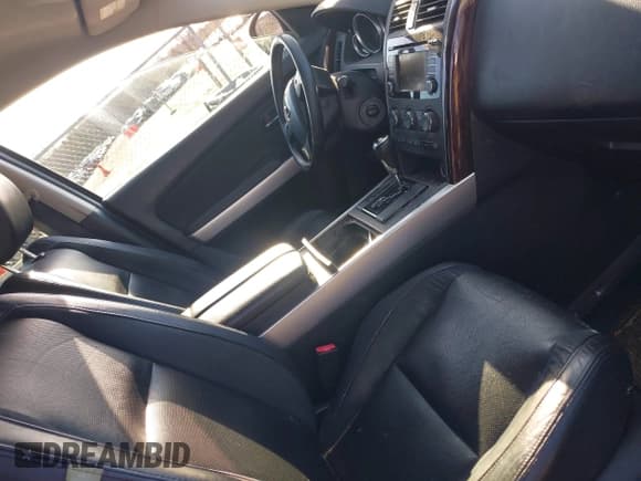 ✅ 2013 Mazda CX-9 Grand Touring • VIN: JM3TB2DA1D0401592 • Lot: 43815559. Wystawiony na IAAI z przebiegiem 229 196 mil. Bezpłatny archiwum sprzedaży aukcyjnych z USA i szczegółowy raport historii pojazdu na DreamBid. Zdjęcie 5.