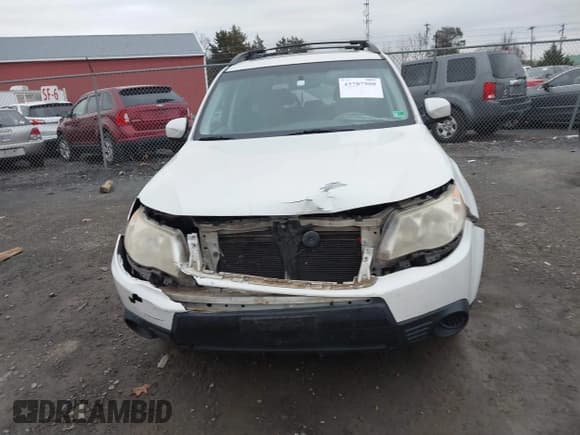 ✅ 2009 Subaru Forester X • VIN: JF2SH63689H721462 • Lot: 43787908. Listed on IAAI with 139,674 mi. Free auction sales archive from the USA and detailed vehicle history report at DreamBid. Image 12.