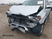 ✅ 2014 Toyota 4Runner SR5 • VIN: JTEZU5JR9E5084038 • Lot: 41607303. Listed on IAAI with 179,995 mi. Free auction sales archive from the USA and detailed vehicle history report at DreamBid. Image 6.