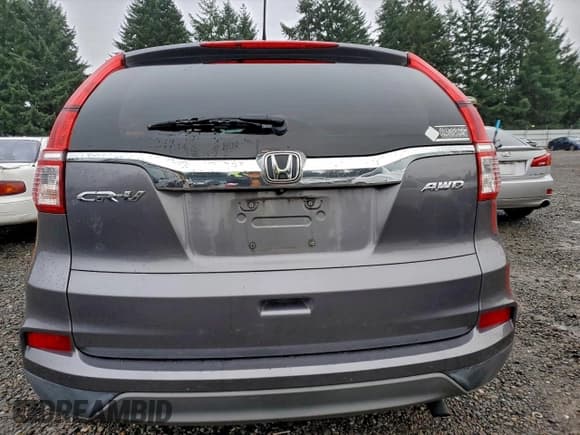 ✅ 2015 Honda CR-V LX • VIN: 2HKRM4H36FH617576 • Lot: 94724275. Listed on Copart with 92,775 mi. Free auction sales archive from the USA and detailed vehicle history report at DreamBid. Image 6.