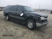 ✅ 2002 Chevrolet Suburban LS • VIN: 3GNEC16Z42G343960 • Lot: 88970245. Wystawiony na Copart z przebiegiem 284 632 mil. Bezpłatny archiwum sprzedaży aukcyjnych z USA i szczegółowy raport historii pojazdu na DreamBid. Zdjęcie 4.