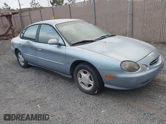 ✅ 1998 Ford Taurus LX • VIN: 1FAFP52S0WG234324 • Lot: 43693473. Wystawiony na IAAI z przebiegiem 193 382 mil. Bezpłatny archiwum sprzedaży aukcyjnych z USA i szczegółowy raport historii pojazdu na DreamBid. Zdjęcie 1.