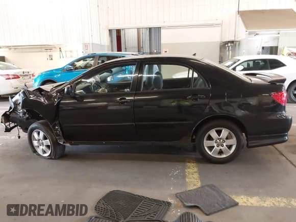 ✅ 2004 Toyota Corolla CE • VIN: 1NXBR32E04Z236148 • Lot: 43410911. Listed on IAAI with 209,991 mi. Free auction sales archive from the USA and detailed vehicle history report at DreamBid. Image 14.