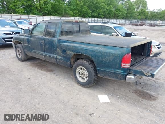 ✅ 1998 Dodge Dakota SLT • VIN: 1B7GL22X4WS554408 • Lot: 42202021. Wystawiony na IAAI z przebiegiem 147 765 mil. Bezpłatny archiwum sprzedaży aukcyjnych z USA i szczegółowy raport historii pojazdu na DreamBid. Zdjęcie 3.