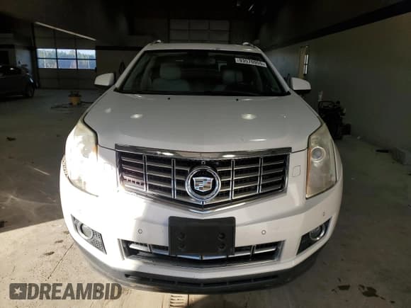 ✅ 2013 Cadillac SRX Performance Collection • VIN: 3GYFNHE39DS528724 • Lot: 93570955. Listed on Copart with 81,758 mi. Free auction sales archive from the USA and detailed vehicle history report at DreamBid. Image 5.