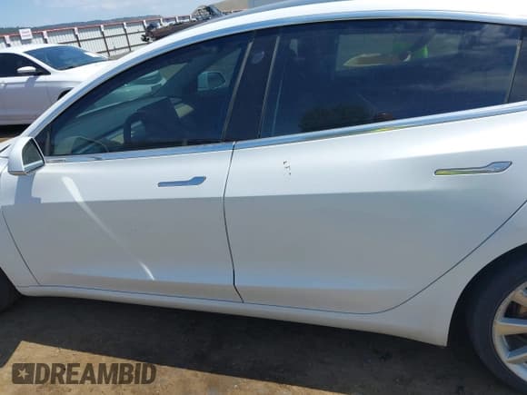 ✅ 2018 Tesla Model 3 Long Range Battery • VIN: 5YJ3E1EAXJF053717 • Lot: 42615984. Listed on IAAI with 79,735 mi. Free auction sales archive from the USA and detailed vehicle history report at DreamBid. Image 13.