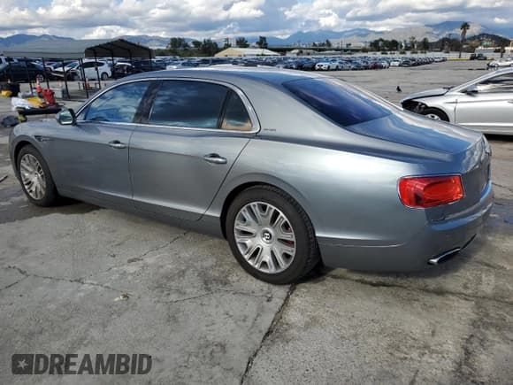 ✅ 2014 Bentley Flying Spur • VIN: SCBEC9ZA0EC089705 • Lot: 44034234. Wystawiony na Copart z przebiegiem 54 751 mil. Bezpłatny archiwum sprzedaży aukcyjnych z USA i szczegółowy raport historii pojazdu na DreamBid. Zdjęcie 2.